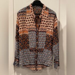 Free People-Women’s blouse.
Size medium. Great shape. Smoke free home.